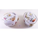 A large oval Royal Worcester Evesham casserole dish and lid and a round one with lid