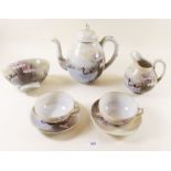 A Japanese eggshell teaset decorated geese and iris comprising: teapot, milk, sugar, seven cups