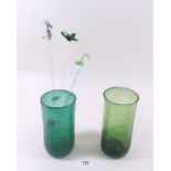 Two bubbled green glass tumblers and five Victorian swizzle sticks