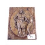 A carved wood plaque of St Peter - 17 x 14 cm