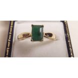 A 9ct gold ring set emerald
