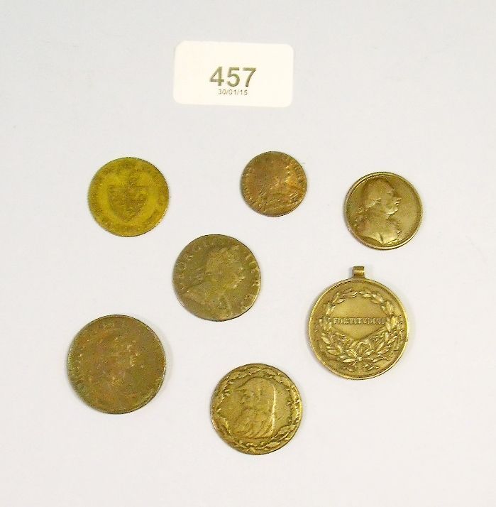 A selection of coins and tokens including: George III 1799 halfpenny, 1774 halfpenny, The Paris