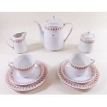 A Chinese porcelain coffee set comprising coffee pot, six cups and saucers, sugar, milk, six tea