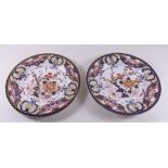 A pair of early 19th century Derby Imari plates