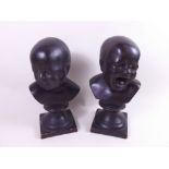 A pair of bronzed terracotta busts of crying babies - 17cm tall