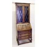 An oak lead glazed bureau/bookcase