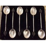 A set of six silver shell bowl coffee spoons, Birmingham 1928 cased