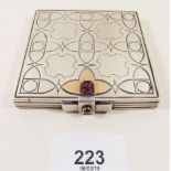 A continental white metal compact set red stones engraved geometric decoration