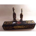 A carved and painted Indian long box and two wooden ducks