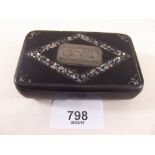 A Victorian lacquer snuff box with mother of pearl inlay and white metal engraved presentation -