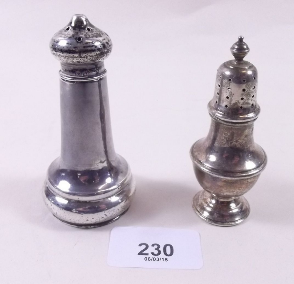 Two silver pepper pots