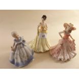 Two Coalport figures - 'Birthday Wishes' and 'Debutante' and another figure