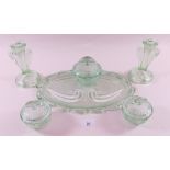 A green glass dressing table set
