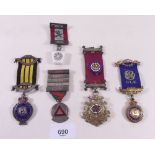 Three silver RAOB jewels, one Masonic jewel and a silver driving medal