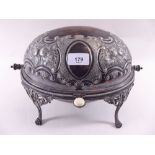 A silver plated swivel top breakfast tureen with embossed decoration