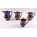 Four Victorian blue and copper lustre jugs