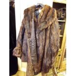 Two old fur coats