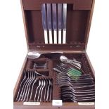 An oak cased part canteen of silver plated cutlery