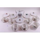 A Goss teaset comprising: teapot, six cups and saucers, sugar and four plates