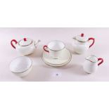 A Wedgwood 'tea for two' set comprising: teapot, milk, hot water jug, sugar and two cups and