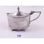 An oval silver mustard pot - Birmingham 1945