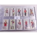Cigarette card sets and odds in black album (sleeves) mainly military - approx 400 cards most in