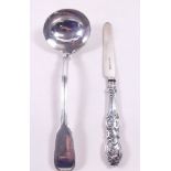 A Victorian silver ladle by Chainer & Co. - London 1858 and a silver butter knife - Sheffield 1878