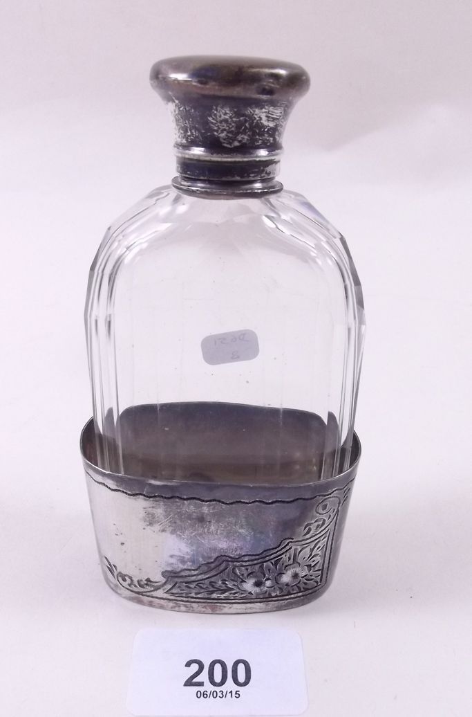 A cut glass spirit flask