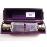 A cut glass and silver plated double ended scent bottle  - boxed