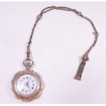 A 14 carat gold fob watch with enamel face on 9 carat gold fob chain