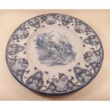 A large Faience charger decorated romantic scenes - 49 cm diameter