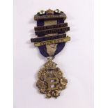 A Primrose League gilt metal and enamel medal with four Special Service bars and 'Founder' bar -