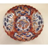 A Chinese Imari large ribbed fruit bowl decorated vase of flowers, trees and bird, - 28 cm diameter,