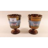 A pair of Victorian copper lustre goblets decorated sheep and dogs