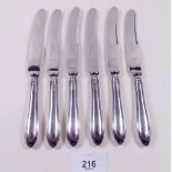 A set of six silver handled tea knives