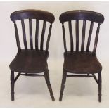 A pair of stick back kitchen chairs