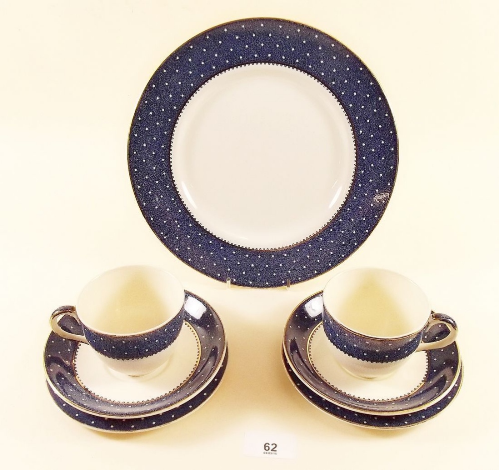 A Ridgeway polka dot part teaset comprising: five cups and saucers, six tea plates and five dinner