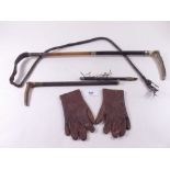 A pair of child's gloves, child's riding crop and ladies riding crop