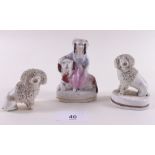 A pair of Victorian Staffordshire poodles , one a/f and another group a/f