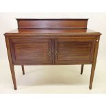 An Edwardian mahogany washstand