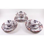 A Masons patent ironstone part dinner service comprising: two sauce tureens, stands and ladles,