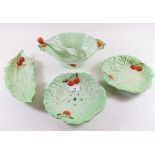 A Carlton Ware foliage strainer dish and stand, salad dish and leaf form dish