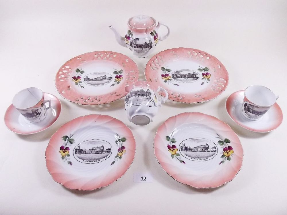 An Edwardian teaset printed scenes of Badminton village and house comprising:- five tea cups and