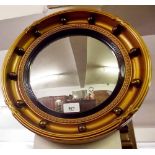 A circular gilt convex mirror - 37cm diameter