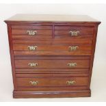 An Edwardian mahogany chest of two short and three long drawers