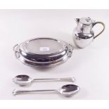 A silver plated entre dish, salad servers and coffee pot