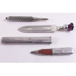 A silver bookmark, a silver cased pencil and another pencil