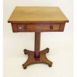 An early 19th century mahogany work table with shell inlay to top over frieze drawer, all on faceted