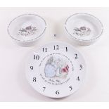 Two Wedgwood Peter Rabbit baby bowls and a clock plate