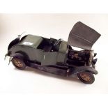 An early 20th century large scale green tin plate vintage car, 40cm - with Michelin tyres